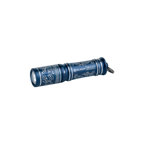 Olight I3E EOS 블루 손전등, 흰색 바탕에 옆면과 키 체인 링이 있는 꽃무늬 패턴으로 장식되어 있습니다.