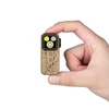 Olight Oclip Pro 골드 한정판 손에 든 모습, 독특한 한자 디자인의 미니 EDC 손전등